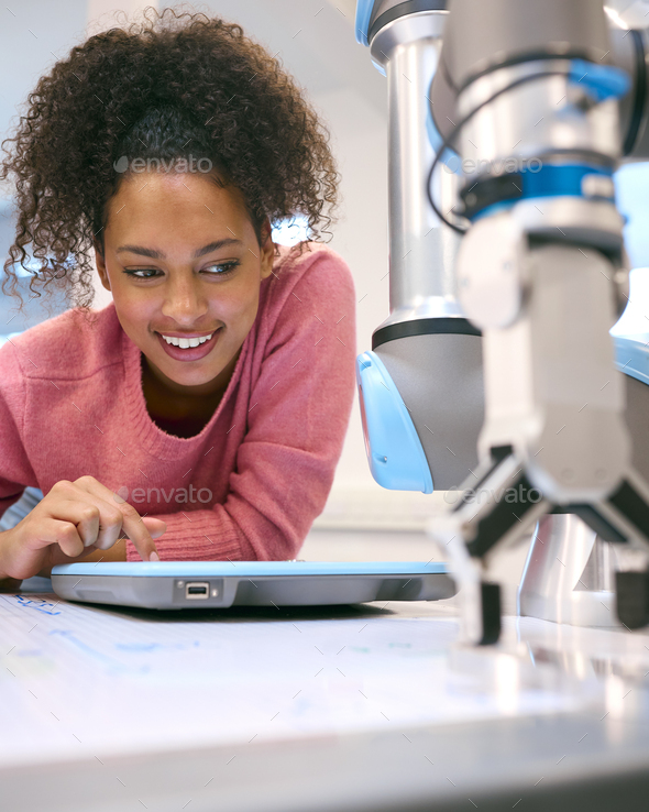 Female College Or University Engineering Student In Robotics Class