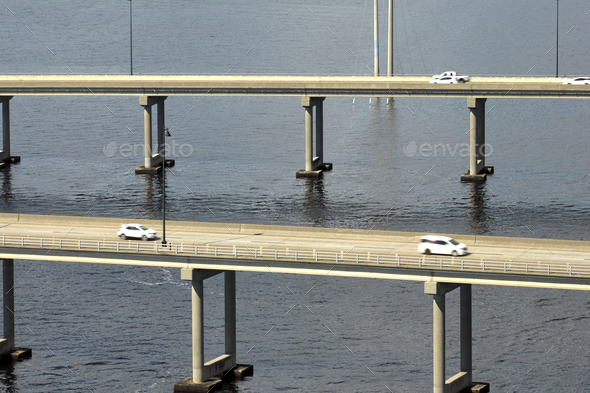 Barron Collier Bridge and Gilchrist Bridge in Florida with moving traffic