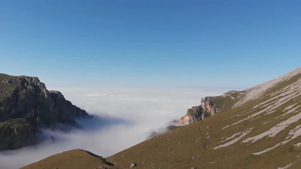Aerial View of Fog in the Mountain Gorge