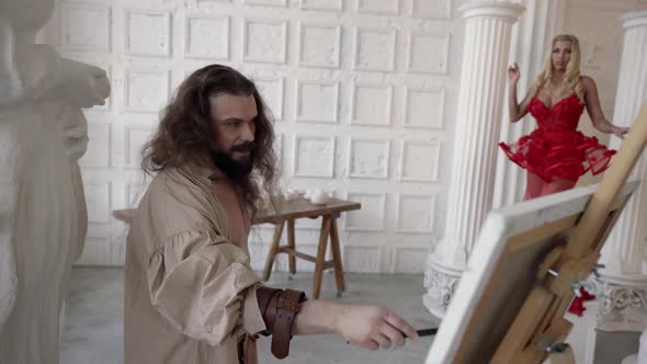 Crazy Artist is Working in His Workshop Painting Beautiful Lady From Life Drawing Portrait alt