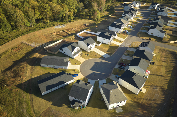 Aerial view of cul de sac at neighbourhood road dead end with densely ...