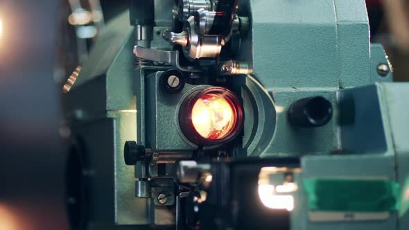 Close Up of a Vintage Film Projector Showing a Tape Movie alt