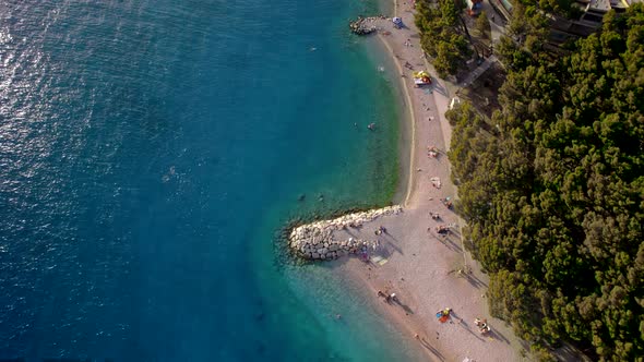 Vertical View of the Sea Coast From Drone at Sunset