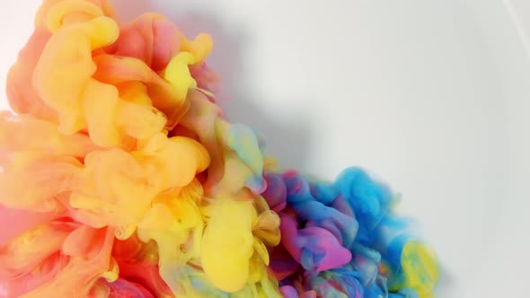 Ink Color Mix Paint Falling on Water Colorful Ink in Water  Footage Red Blue Orange Yellow alt