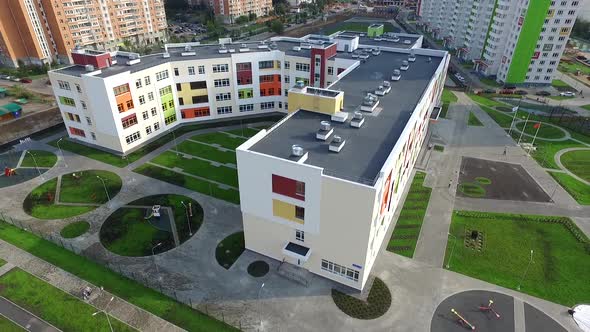 the exterior of the new modern school in the modern residential district,exterior alt