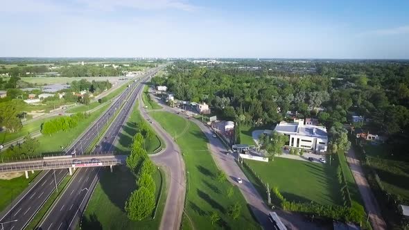 Aerial Drone Scene of City Traffic. Cars and Trucks Movement are Filmed. Aerial Highway alt