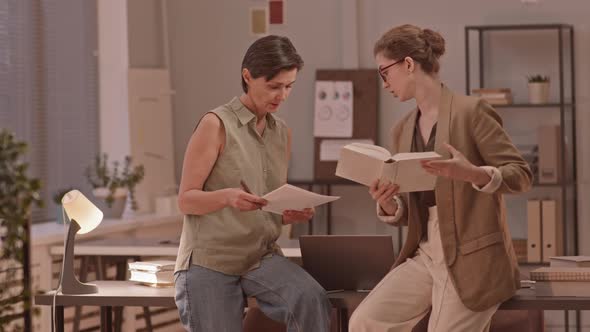Mature Woman and Teacher Talking during Individual Lesson alt