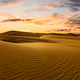 Sunset over the sand dunes in the desert. Sahara desert - PhotoDune Item for Sale