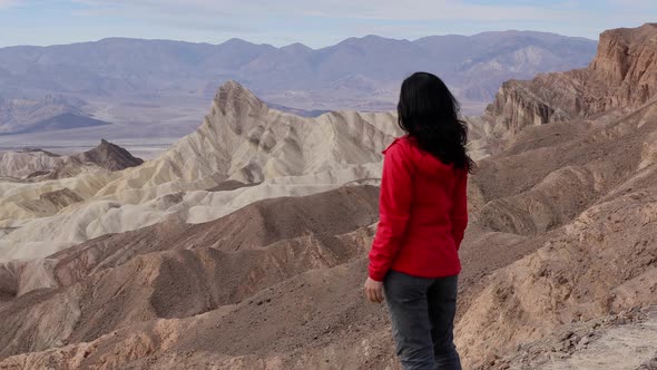 Asian Woman Hiking In Death Valley alt