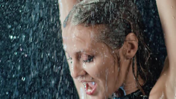 Close Up Seductive Face Expression of Fashionable Dancer Lady Under Rain alt