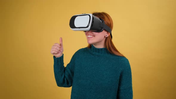 Young Woman Using VR App Headset Helmet alt