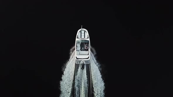  Boat Sailing in Black Water