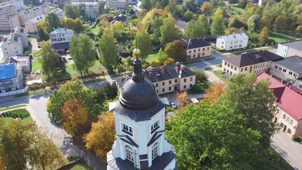 Latvia, Aluksne Old Lutheran Church With Golden Cock Statue on the Top of Tower, Aerial Dron 4K Shot alt