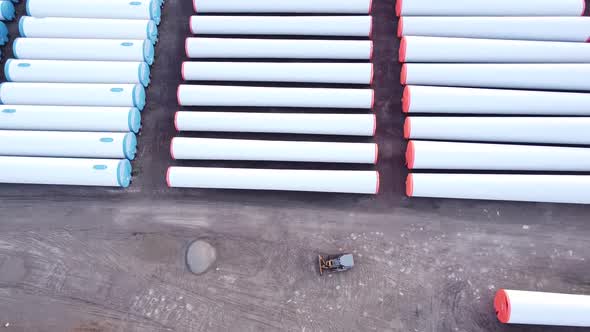 Huge Components Of Wind Turbine Towers In A Manufacturing Compound in Monroe, Michigan - ascending d alt