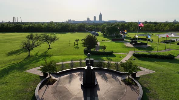 Aerial view of a war memorial at the USS Alabama Battleship Memorial Park alt
