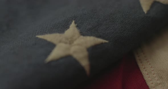 Detail of American flag with 13 stars of the revolution alt