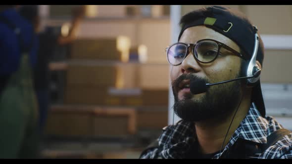 Man Having Phone Call in Distribution Center alt