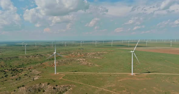 Wind turbines of many windmill renewable energy a field in Southeast Texas the USA alt