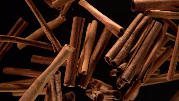 Super Slow Motion Shot of Cinnamon Explosion on Black Background at 1000Fps. alt