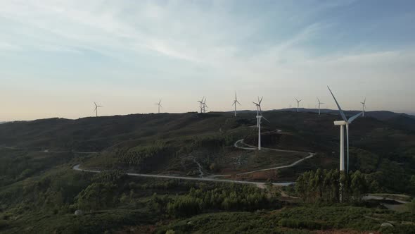 Aerial Footage of Wind Energy Converters at a Wind Farm alt