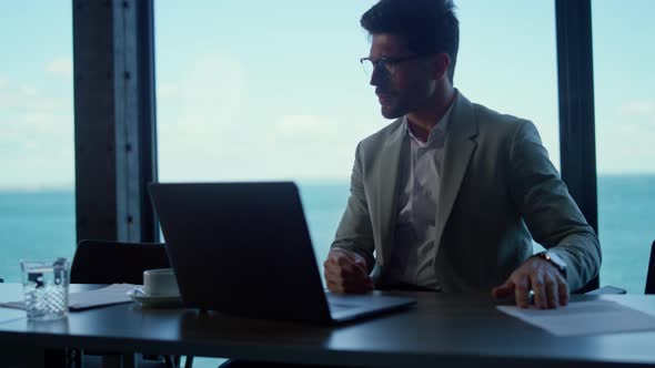 Man Expert Reading Documents at Marina Seaport View alt
