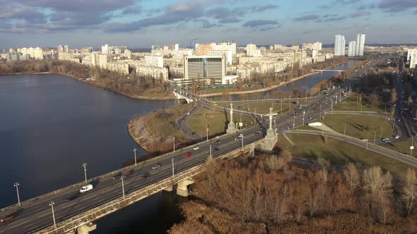 City Traffic on the Bridge, View of Rusanovka
