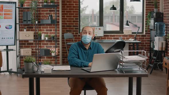 Business People Doing Elbow Greeting During Pandemic alt