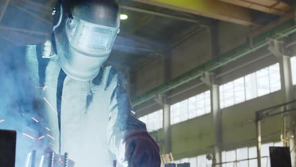 Factory worker welding details