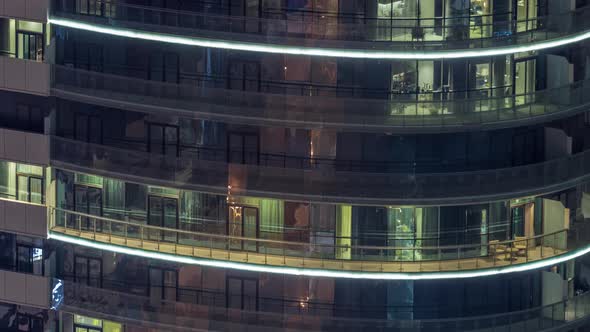Big Glowing Windows in Modern Residential Buildings Timelapse at Night alt