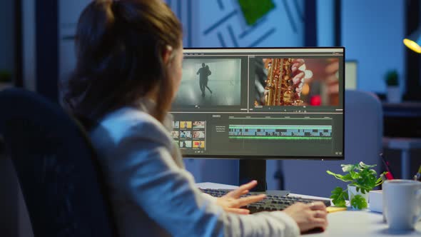 Video Editor Working at Night at New Project Editing Audio Film Montage alt