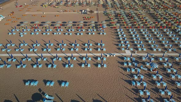 The Hundreds of Beach Chairs on the Coast of Rimini alt