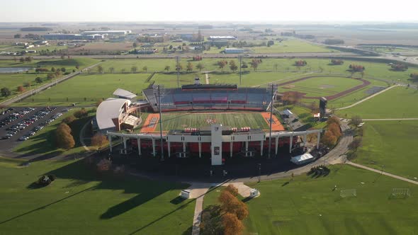 Bowling Green State University Doyt L. Perry football stadium side shot zoom in drone video. alt