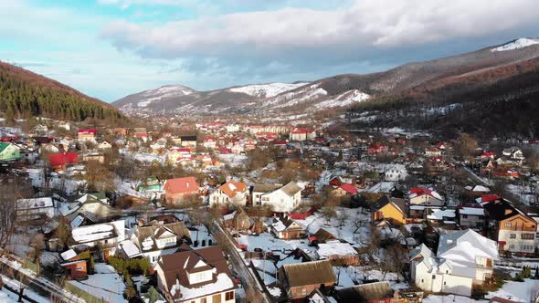 Aerial View of a Village in the Carpathian Mountains in Winter. Yaremche, Ukraine. alt