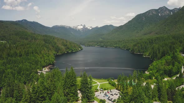 Aerial view of the spectacular mountain scenery around Capilano Lake in North Vancouver. alt
