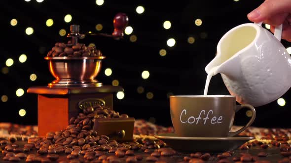 Cream Is Added To Cup of Hot Beverage alt