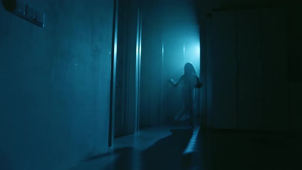 Ghost Girl In White Nightgown With Loose Hair In A Scary House, Stock 