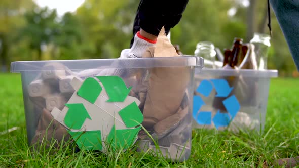 Volunteer Cleaning Up Environment. Recycle Concept alt