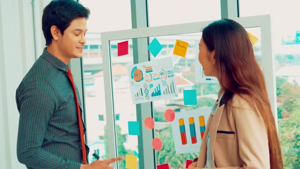 Business People Work on Project Planning Board alt