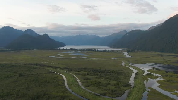Beautiful Aerial Panoramic View of Canadian Mountain Landscape during a vibrant summer sunset. Taken alt