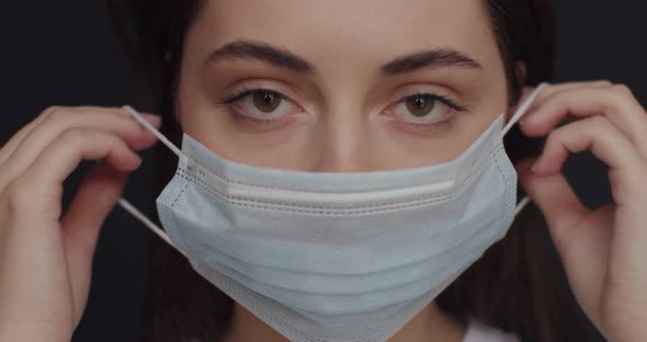 Portrait of Beautiful Female Doctor Wearing Medical Face Mask Indoors in Office