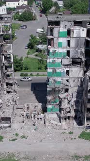 Vertical Video of a Destroyed Residential Building in Ukraine During the War alt
