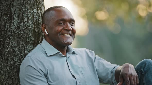 Portrait Elderly African Man Sitting Under Tree Entrepreneur Resting in Park alt