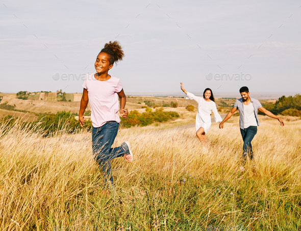 child daughter family happy mother father running active healthy ...