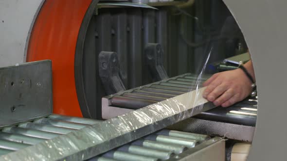 Packaging Film of Metal Products at Work