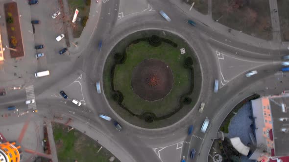  Aerial View Timelapse of Roundabout Road with Circular Cars. alt