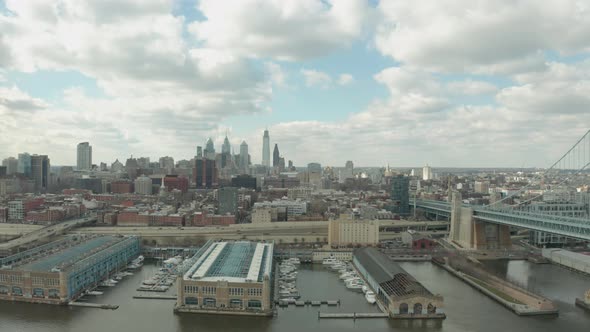 Aerial Drone Shot of Philadelphia Downtown Skyline From Over Waterfront