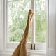 Chilling at home with feet up by the window on a lazy day. - PhotoDune Item for Sale