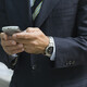 Business executive checking smartphone - PhotoDune Item for Sale