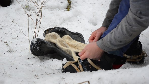 Man Tying Shoelaces