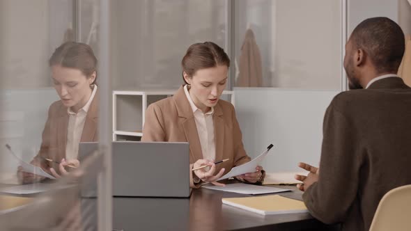 Female HR Manager Interviewing Applicant alt